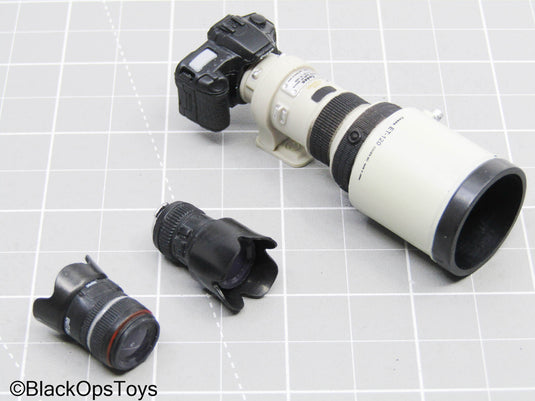 Black Camera w/Super Telephoto Lens & Extra Camera Lenses