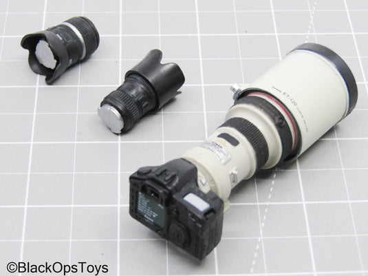Black Camera w/Super Telephoto Lens & Extra Camera Lenses