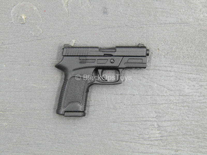 Load image into Gallery viewer, TDKR - Selina Kyle - Spring Loaded Black Pistol
