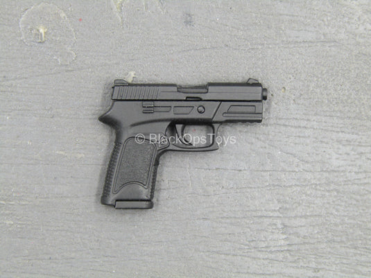 TDKR - Selina Kyle - Spring Loaded Black Pistol