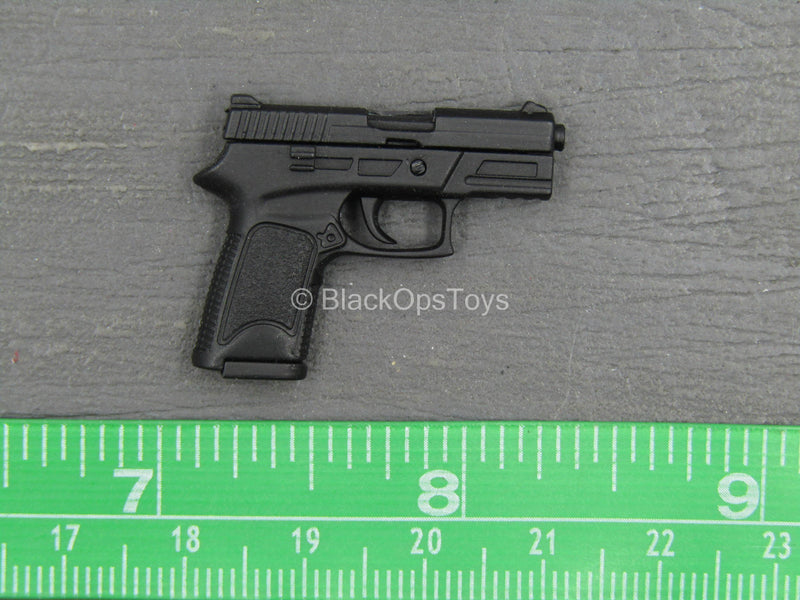 Load image into Gallery viewer, TDKR - Selina Kyle - Spring Loaded Black Pistol

