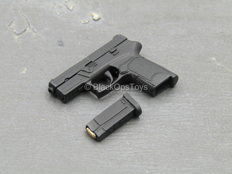 Load image into Gallery viewer, TDKR - Selina Kyle - Spring Loaded Black Pistol
