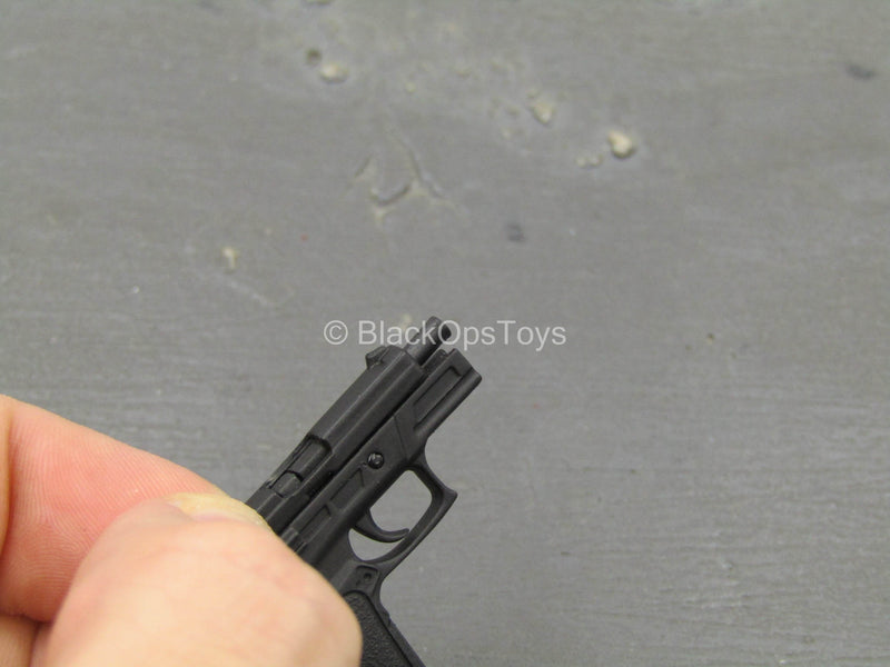 Load image into Gallery viewer, TDKR - Selina Kyle - Spring Loaded Black Pistol
