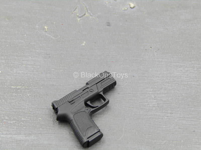 Load image into Gallery viewer, TDKR - Selina Kyle - Spring Loaded Black Pistol

