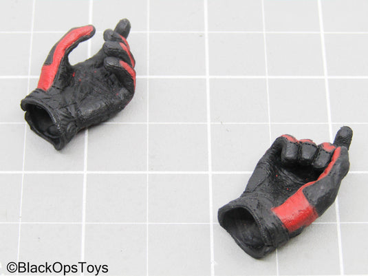 Black & Red Gloved Hands