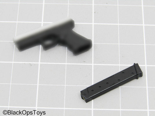 9mm Black & Silver Pistol w/Mag Stick