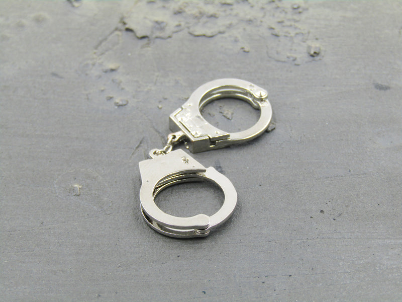 Load image into Gallery viewer, OSN Saturn Police - Silver Hand Cuffs
