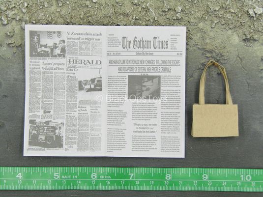 The Entertainer - Newspaper w/Tan Bag